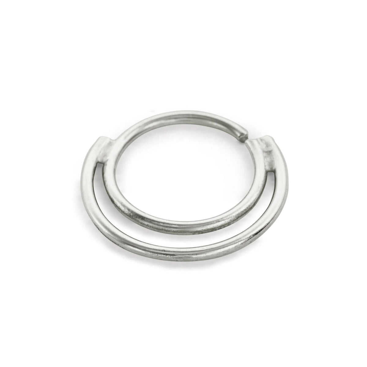 A silver-colored metal ring with a circular shape and two curved ends.
