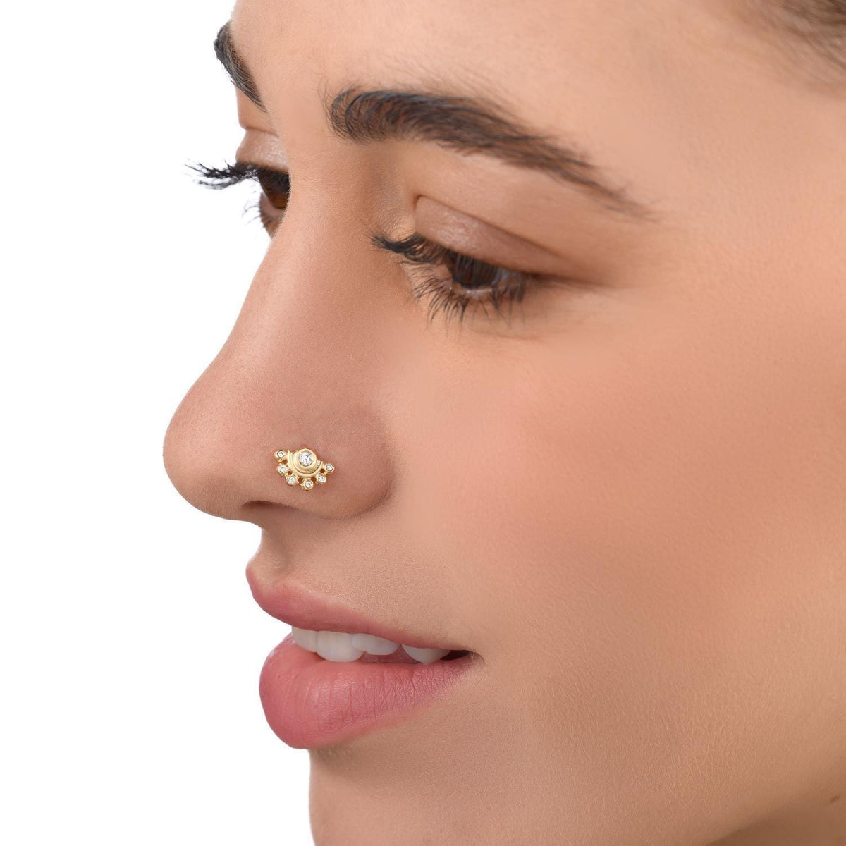 A close-up of a woman's face, focusing on her nose and lips.