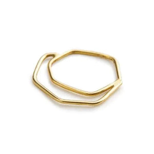 A gold-colored ring with a hexagonal shape.