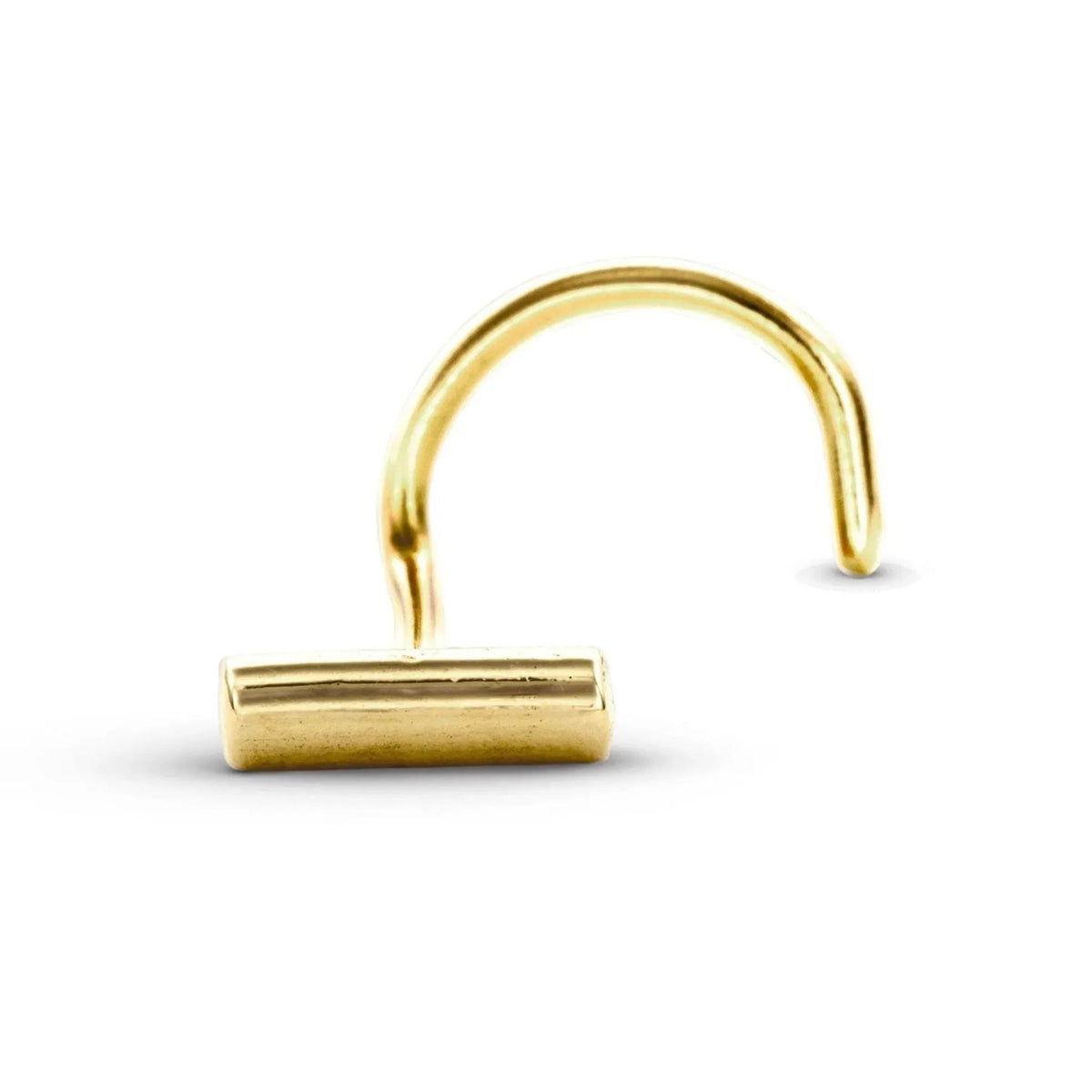 A gold-colored metal nose ring is shown against a white background.