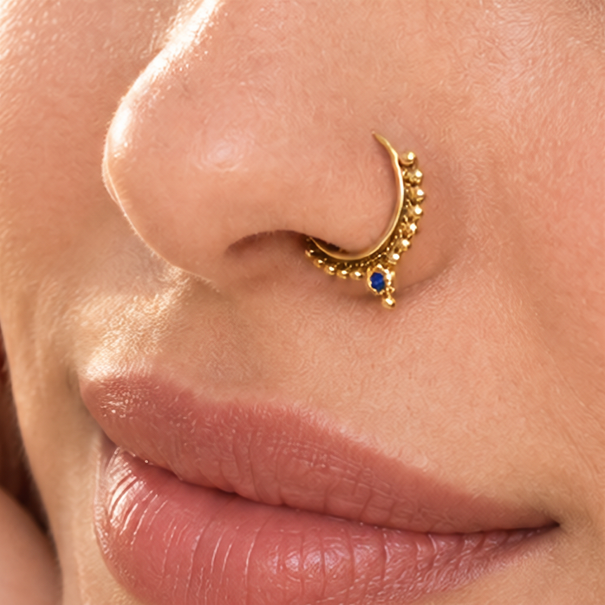 A close-up of a person's face, focusing on their nose and lips.