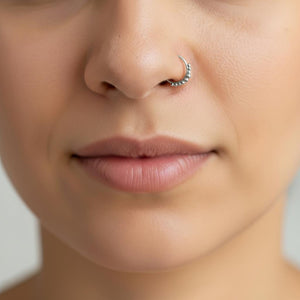 A close-up of a person's face, focusing on their nose and mouth area.
