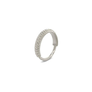 A silver ring with a textured band and small, round stones or crystals embedded in it.
