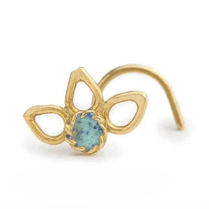 A gold-colored nose ring with a blue gemstone in the center, accompanied by a measurement indicating the length of the nose ring is 8 millimeters (5-16 inches).