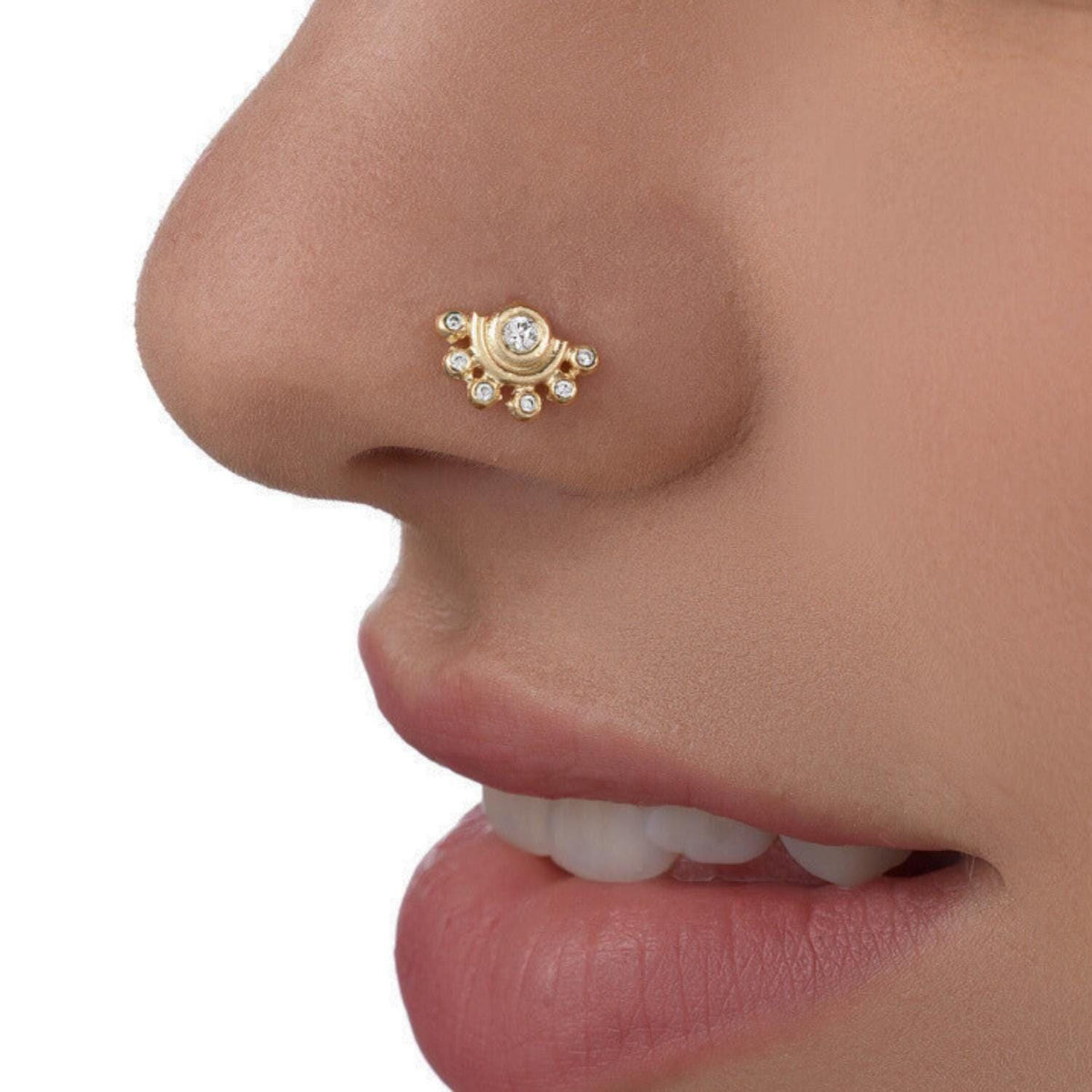 Indian Nose Stud: A close-up of a person's face, focusing on their nose and mouth area.