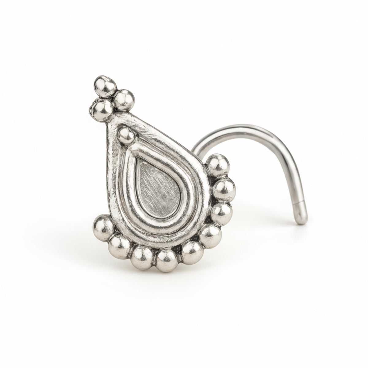 A silver-colored metal nose ring with a decorative design on the front.