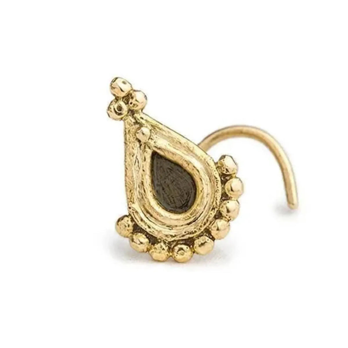 A gold-colored nose ring with a dark stone or gemstone in the center, surrounded by small golden beads or stones.