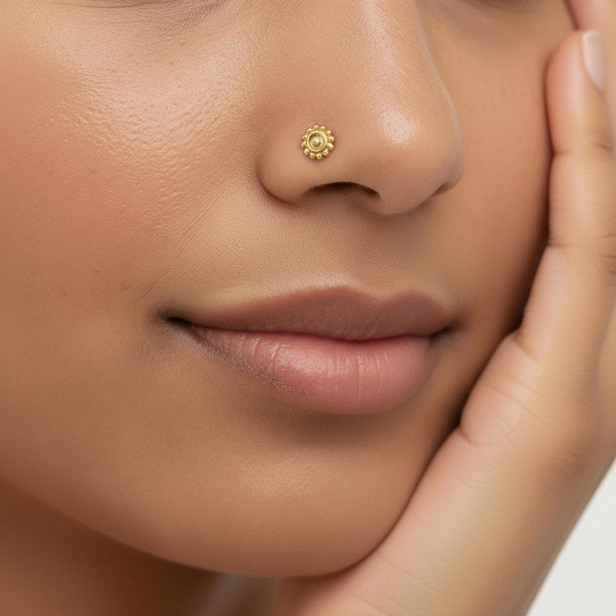 A close-up of a person's face, focusing on their nose and lips.