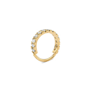 A gold-colored ring with a curved band and small diamonds or stones along the edge.