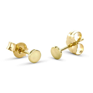 A pair of gold-colored earrings with round pendants.