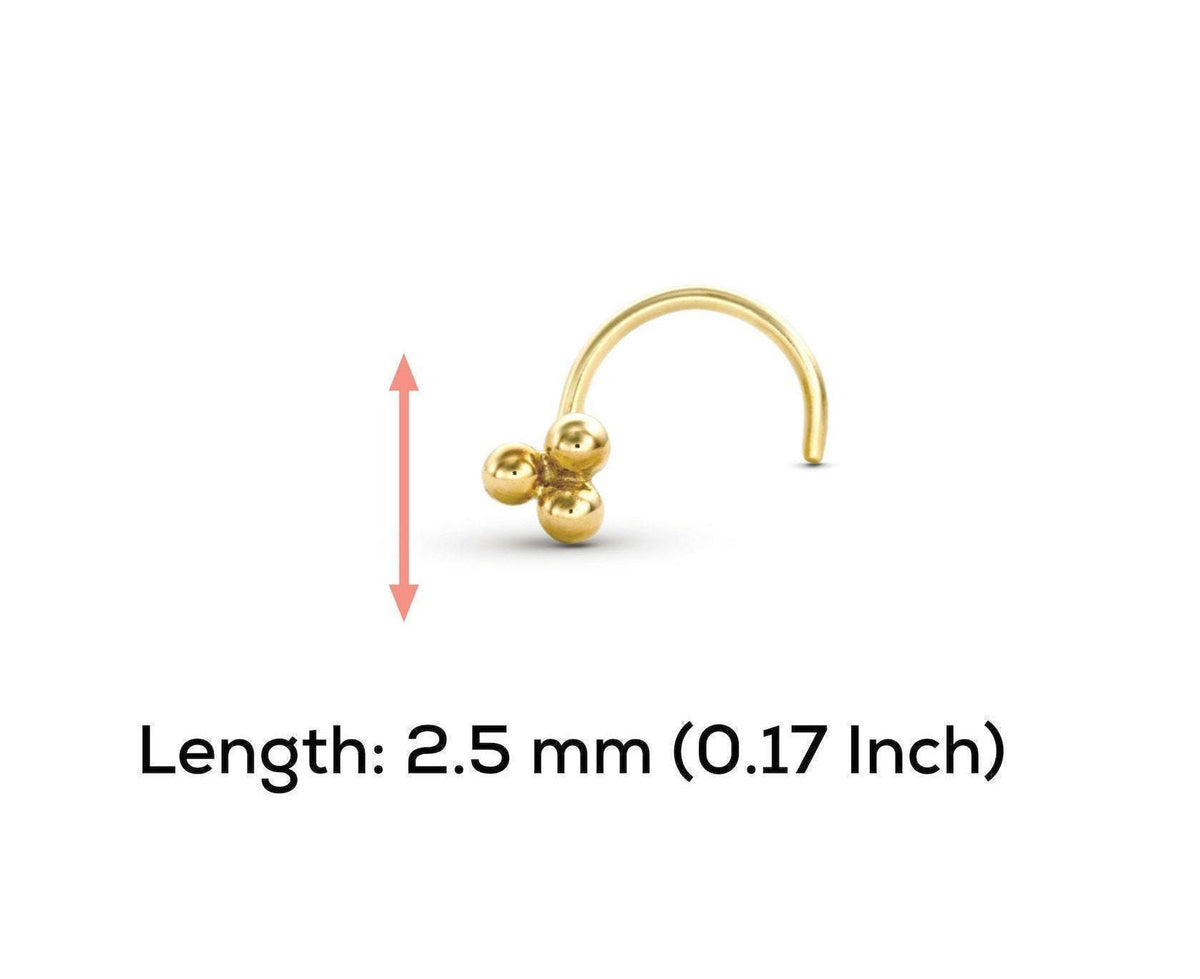 A gold-colored nose stud with three small balls on it, and the image provides the length of the nose stud in millimeters (2.5 mm) and inches (0.17 inch).