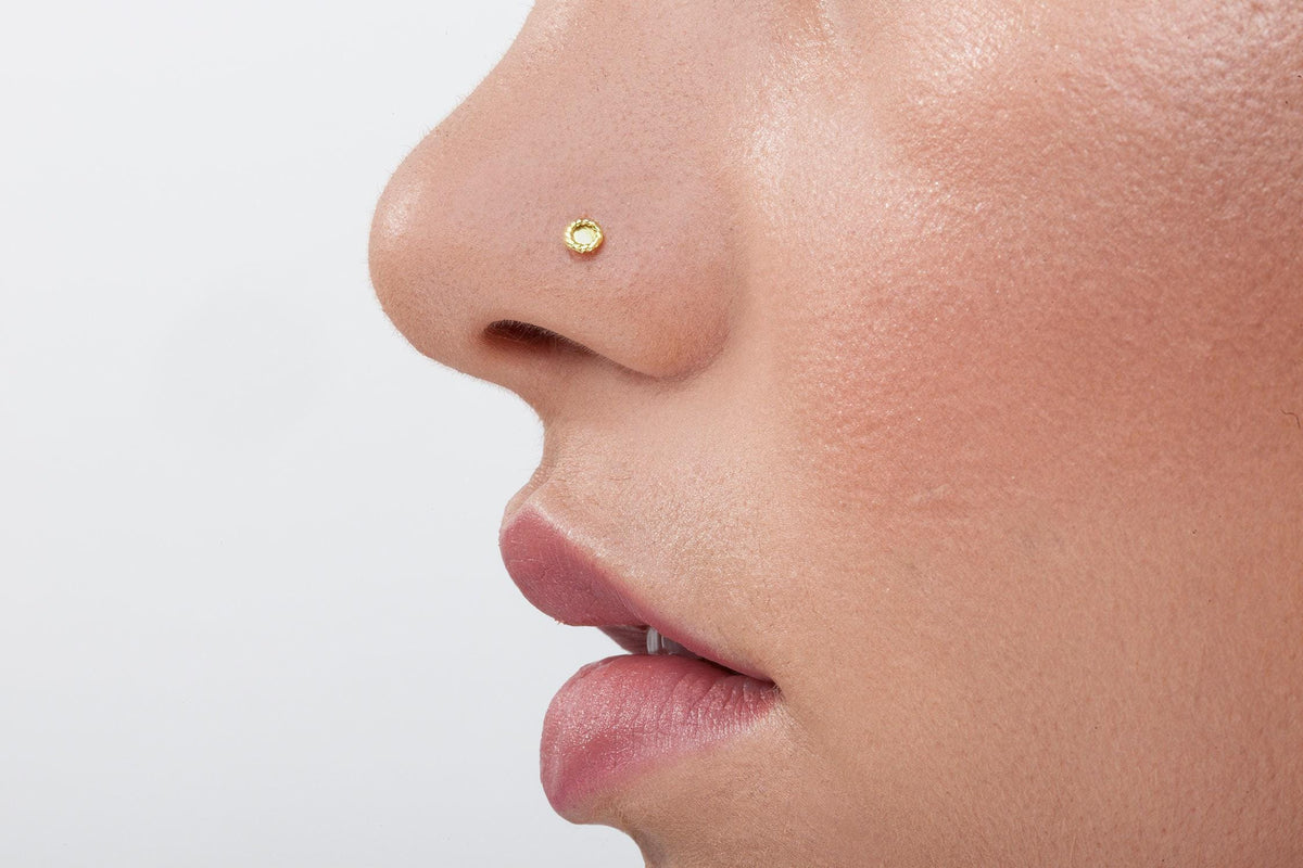 A close-up of a person's face, focusing on their nose and mouth area.