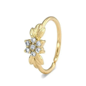 Flower Diamond Nose Ring: A gold ring with a flower-shaped gemstone set in the center.