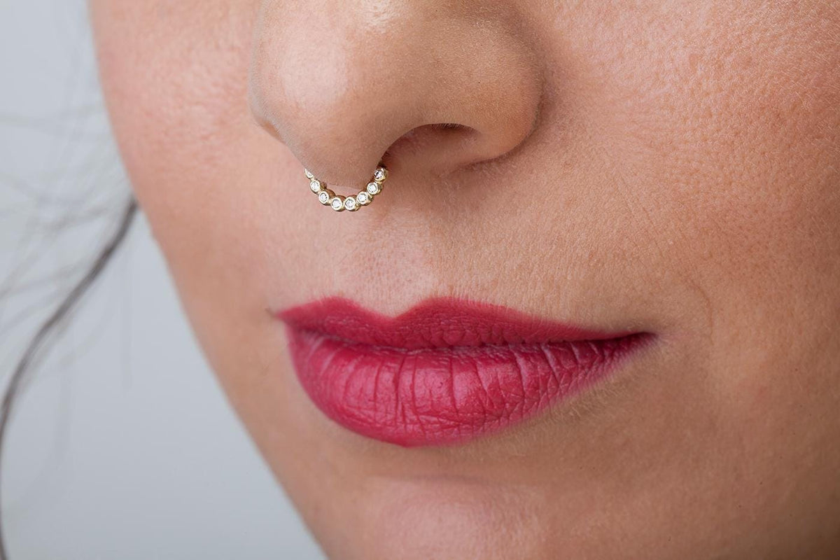 A close-up of a person's face, focusing on their lips and nose.