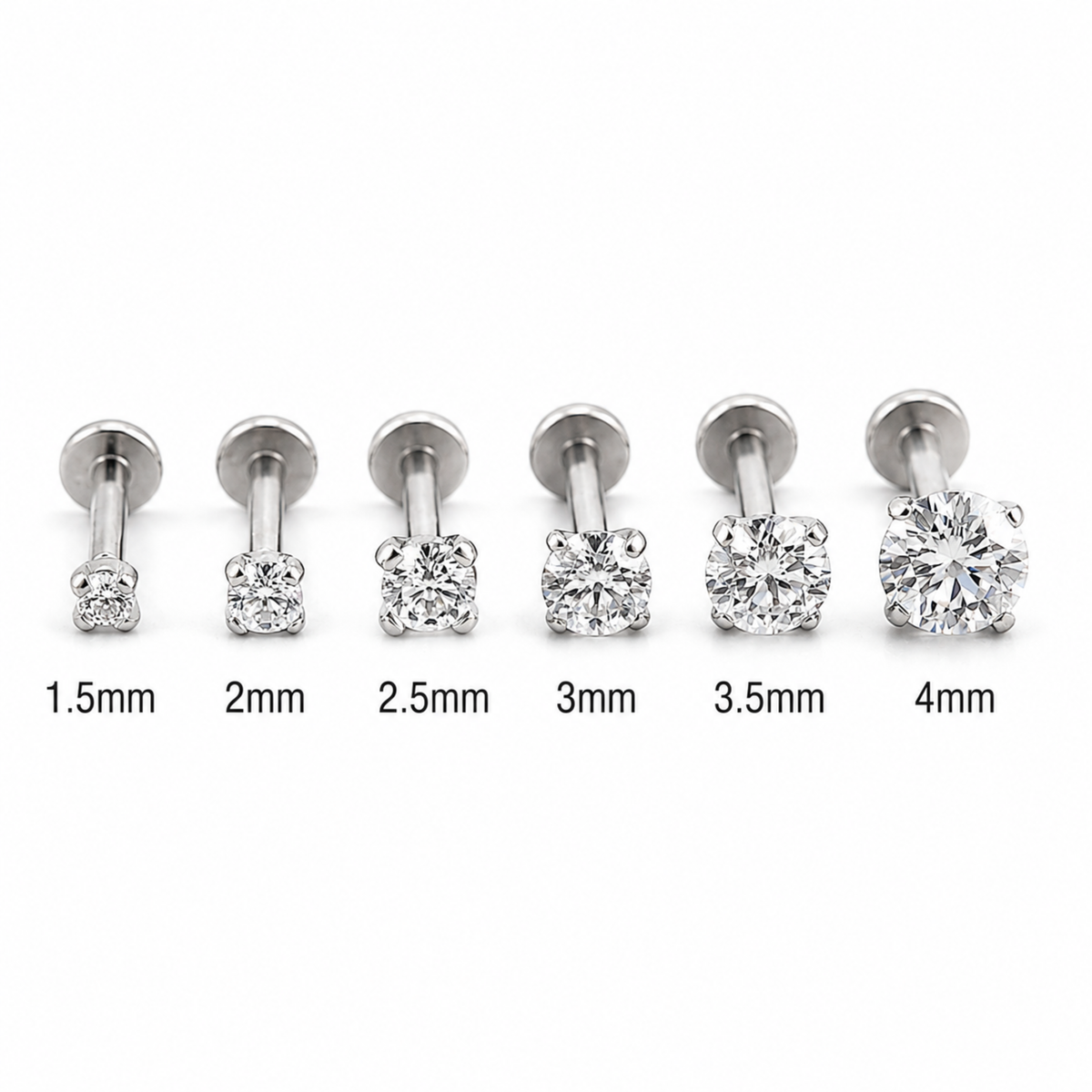A collection of six different sizes of diamond-encrusted piercings, ranging from 1.5mm to 4mm in diameter.
