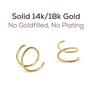 three gold-colored spiral earrings, each with a unique design.