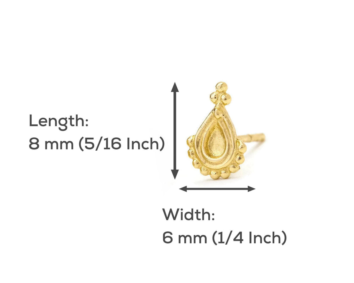a gold earring with a detailed design, and it is described in terms of its length and width.