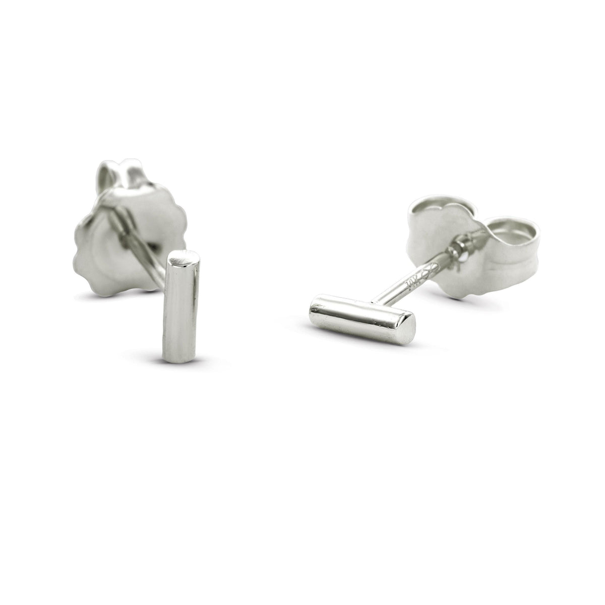 A pair of silver earrings with a single bar-shaped charm.