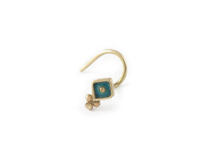 Artistic Enamel Nose Stud: A gold-colored earring with a blue gemstone and a small decorative element attached to it.