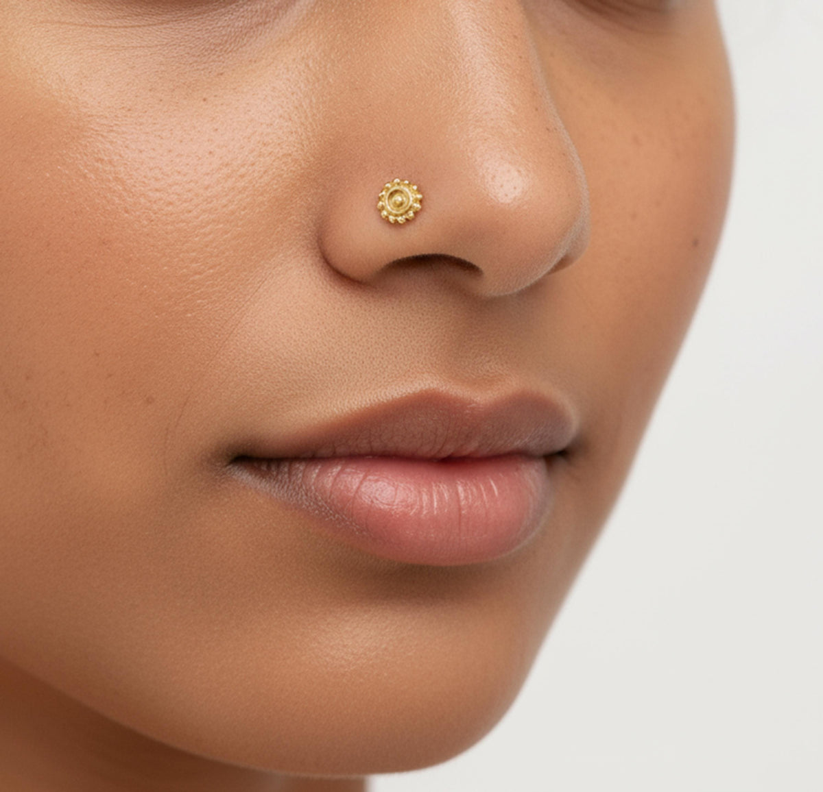 A close-up of a person's face, focusing on their nose and mouth area.